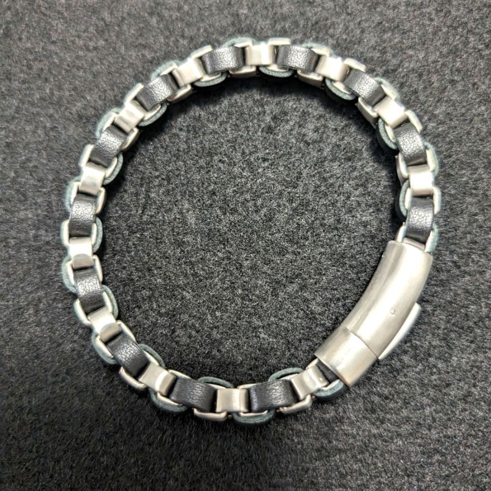 Invicta Stainless Steel and Leather Bracelet Unisex